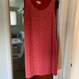 Asymmetrical Tank style/sleeveless dress.  Red w/ floral print.